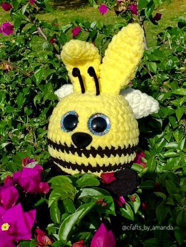 Crocheted Bee themed bunny made with bulky blanket yarn and sparkly 35mm safety eyes.